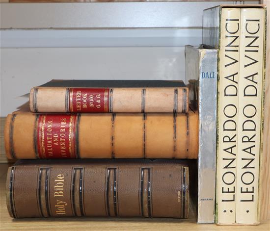 Two half-calf ledgers, Dali and Da Vinci books and a Victorian family bible